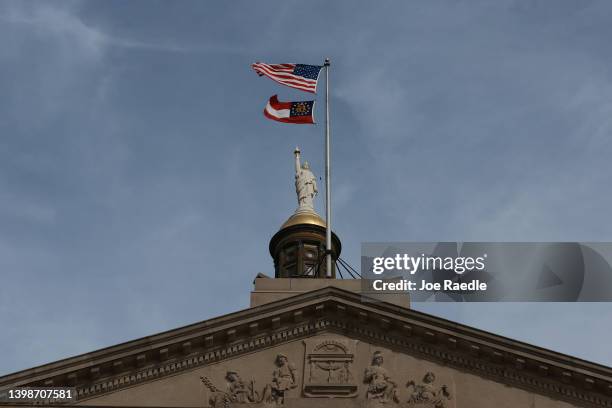 The Miss Freedom statue sits atop the Georgia State Capitol dome on May 22, 2022 in Atlanta, Georgia. The state of Georgia will hold its primary...