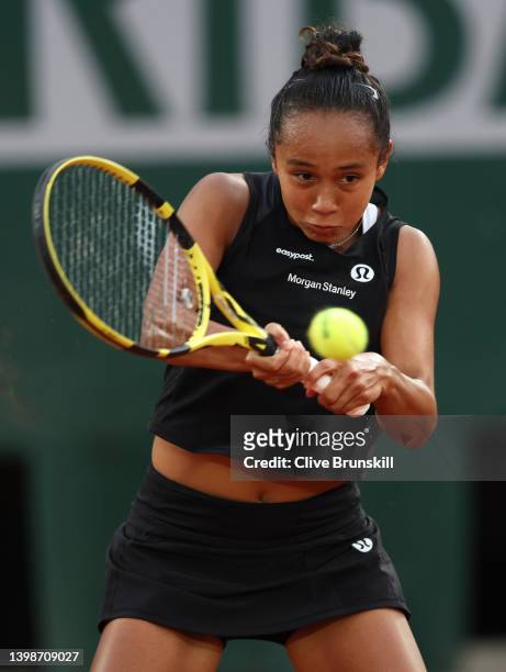 Leylah Fernandez of Canada plays a backhand against Kristina Mladenovic of France in their womens singles first round match during the 2022 French...