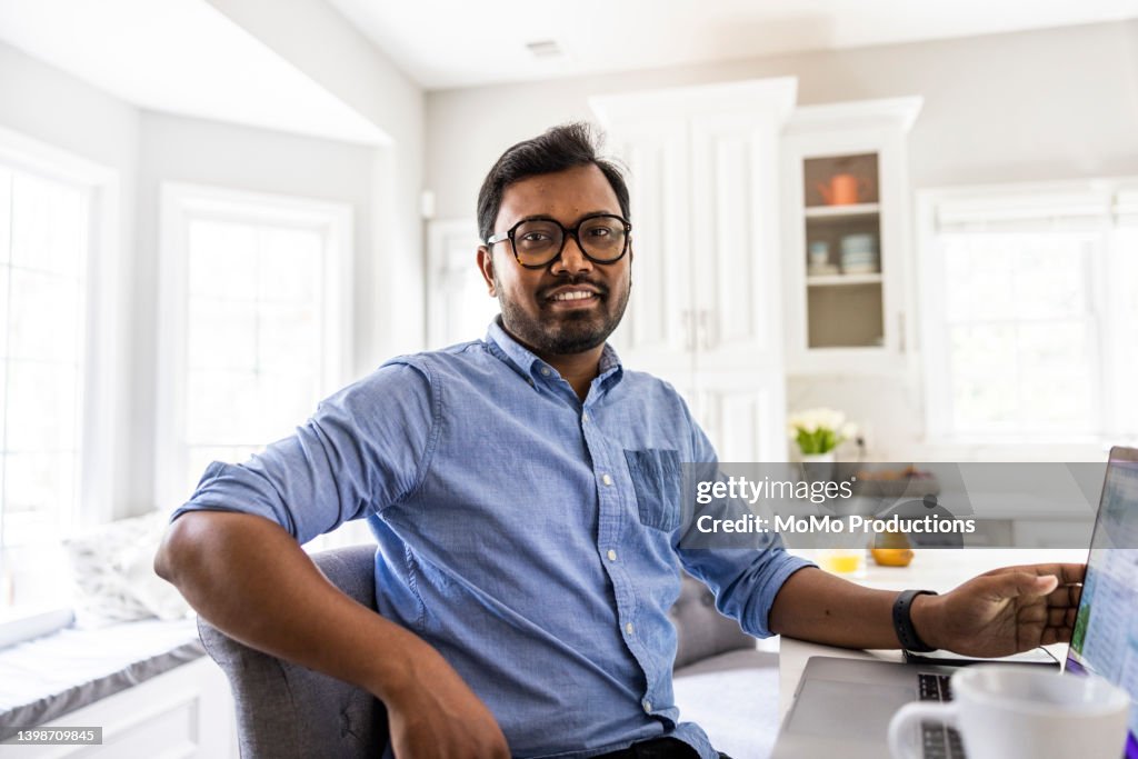 Portrait of businessman working from home