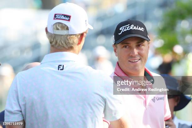 Justin Thomas of the United States and Will Zalatoris of the United States shake hands on the 13th tee, the first playoff hole, during the final...