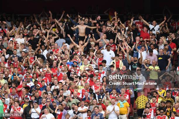Arsenal fans during the Premier League match between Arsenal and Everton at Emirates Stadium on May 22, 2022 in London, England.