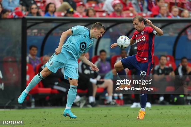 Robin Lod of Minnesota FC and Paxton Pomykal of FC Dallas battle for the ball during the MLS game between FC Dallas and Minnesota United FC at Toyota...