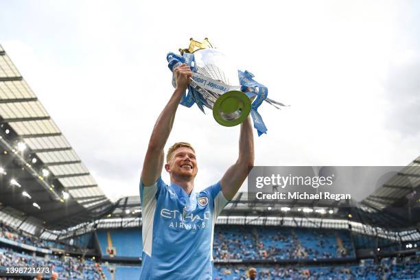 Kevin De Bruyne of Manchester City celebrates with the Premier League trophy during the Premier League match between Manchester City and Aston Villa...