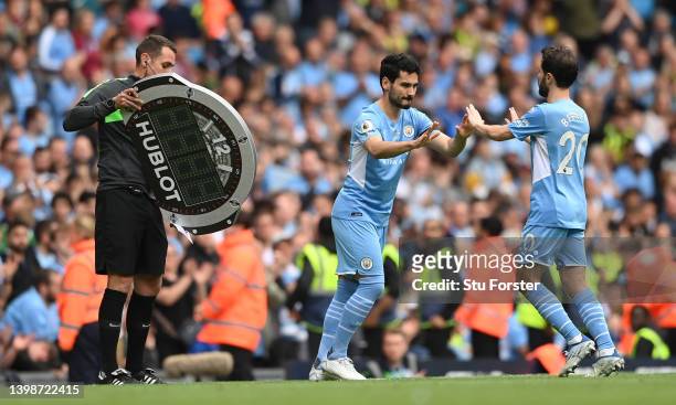Manchester City substitute Ilkay Gundogan comes on for Bernardo Silva duri the Premier League match between Manchester City and Aston Villa at Etihad...