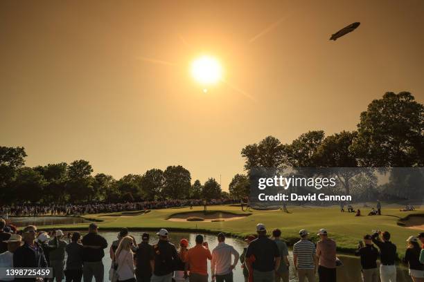 General view of spectators watching Justin Thomas of The United States and Will Zalatoris putt on the 13th hole, the first hole of the sudden-death...
