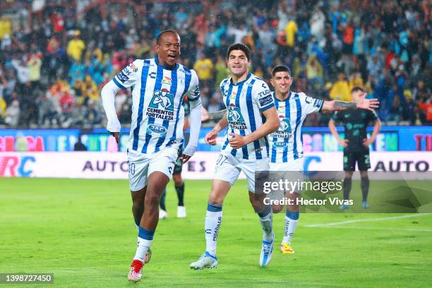 Romario Ibarra of Pachuca celebrates with teammates after scoring his team’s first goal during the semifinal second leg match between Pachuca and...