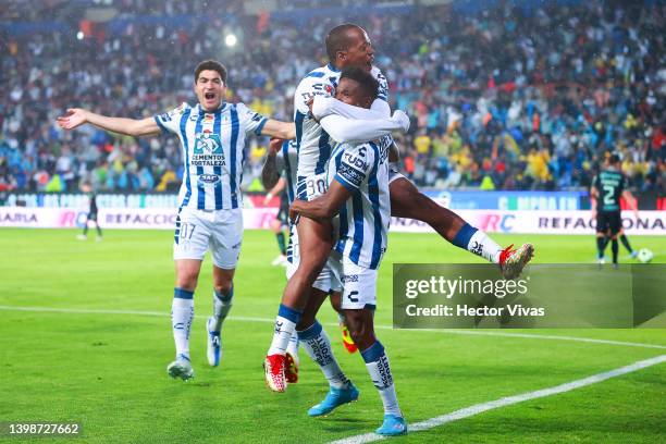 Romario Ibarra of Pachuca celebrates with teammates after scoring his team’s first goal during the semifinal second leg match between Pachuca and...