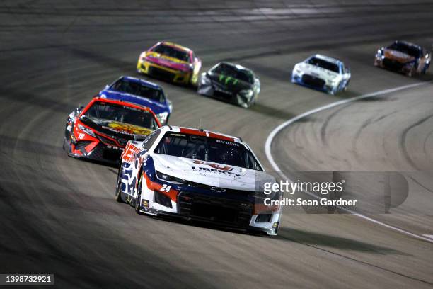 William Byron, driver of the Liberty University Chevrolet, leads the field during the NASCAR Cup Series All-Star Race at Texas Motor Speedway on May...