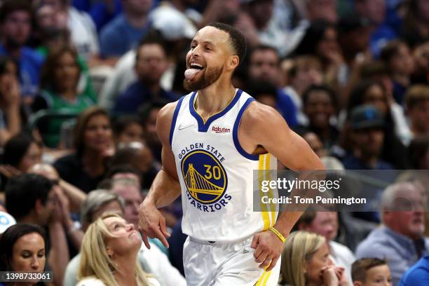 Stephen Curry of the Golden State Warriors reacts to a play during the second quarter against the Dallas Mavericks in Game Three of the 2022 NBA...