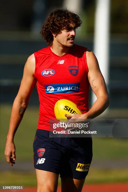 Luke Jackson of the Demons looks on during a Narrm / Melbourne Demons AFL training session at Olympic Park on May 23, 2022 in Melbourne, Australia.