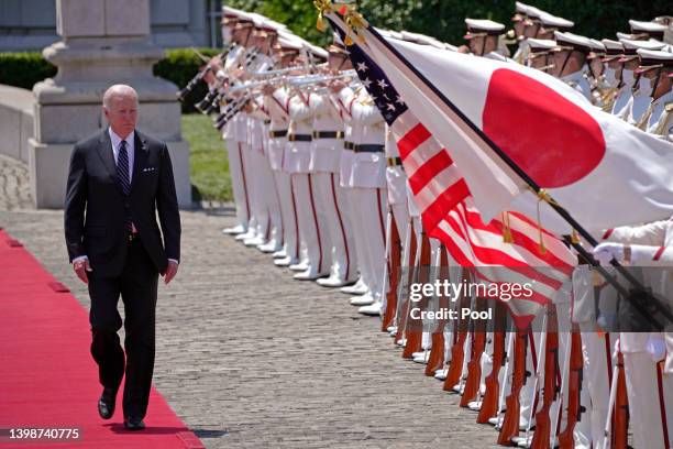 President Joe Biden reviews an honour guard during a welcome ceremony for Biden at the Akasaka State Guest House on May 23, 2022 in Tokyo, Japan....