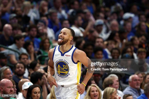 Stephen Curry of the Golden State Warriors reacts to a play during the second quarter against the Dallas Mavericks in Game Three of the 2022 NBA...