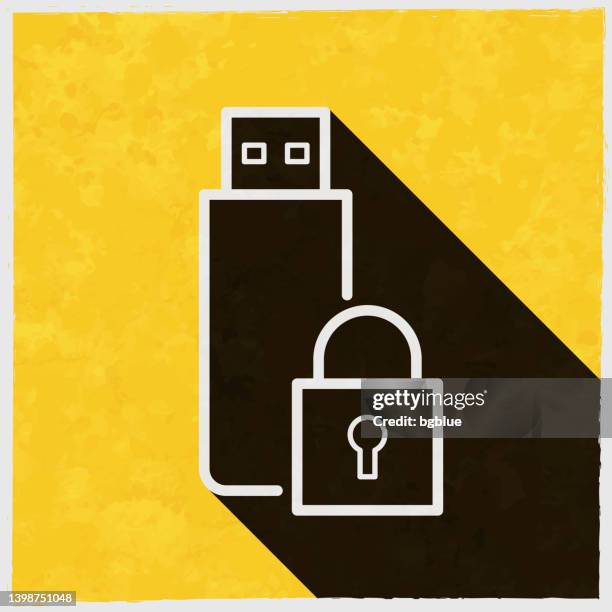 usb flash drive with padlock. icon with long shadow on textured yellow background - steering lock stock illustrations