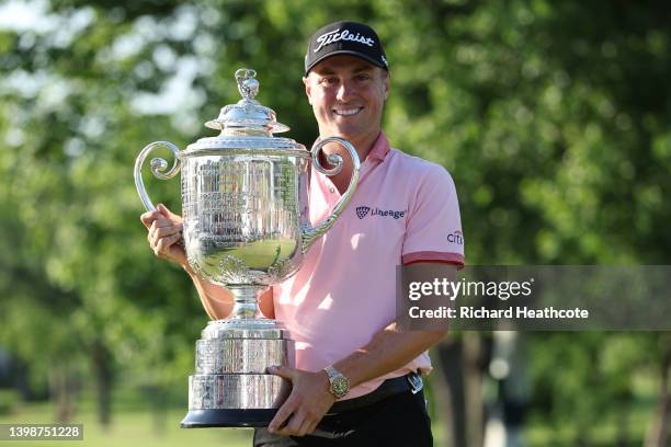 Justin Thomas of the United States poses with the Wanamaker Trophy after beating Will Zalatoris in a playoff to win during the final round of the...