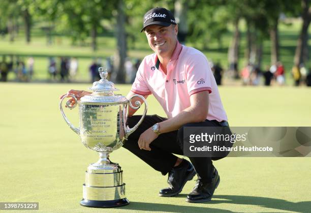Justin Thomas of the United States poses with the Wanamaker Trophy after beating Will Zalatoris in a playoff to win during the final round of the...