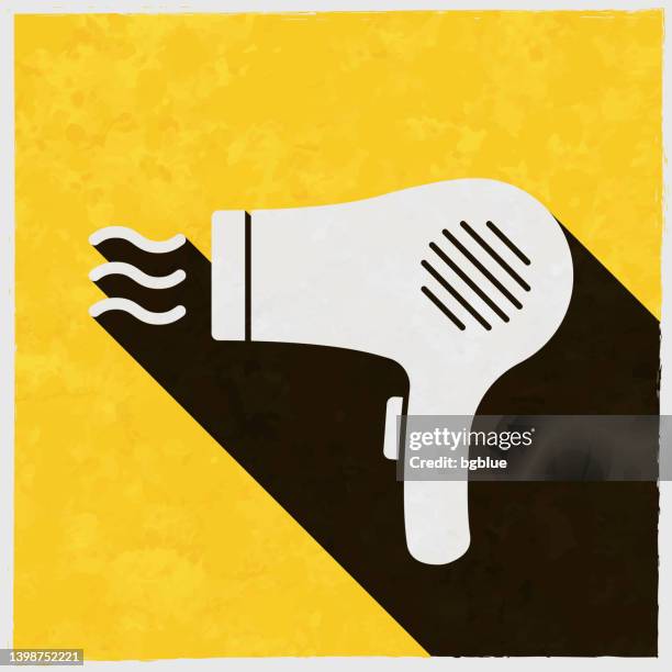 stockillustraties, clipart, cartoons en iconen met hair dryer. icon with long shadow on textured yellow background - haar föhnen