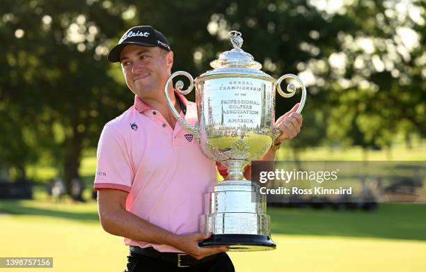 Justin Thomas of the USA celebrates with the Wanamaker Trophy after the final round of the PGA Championship at Southern Hills Country Club on May 22,...