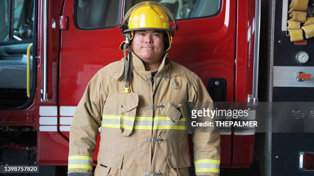 firefighter portriait - firefighter uniform stock pictures, royalty-free photos & images