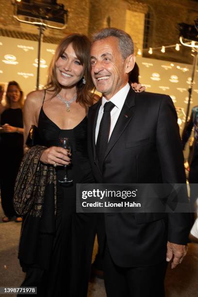 Carla Bruni and Nicolas Sarkozy attend the annual Kering "Women in Motion" awards at Place de la Castre on May 22, 2022 in Cannes, France.