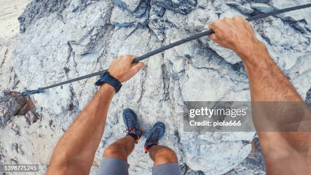 point of view video: via ferrata on the alps - action camera stock pictures, royalty-free photos & images