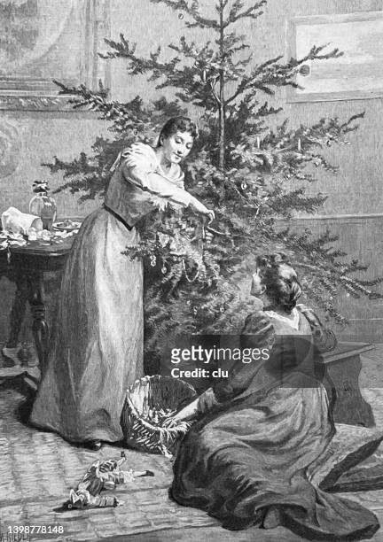 two women decorating the christmas tree - ethnic woman at christmas stock illustrations