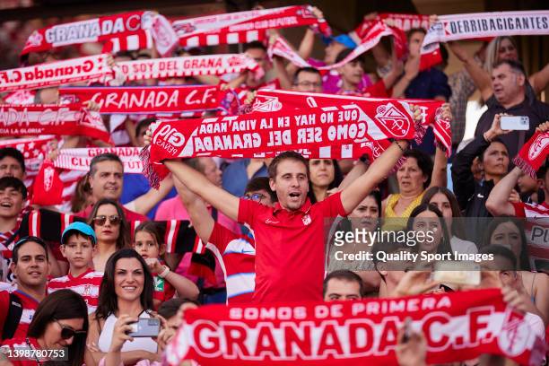 Fan of Granada CF sings the anthem with his scarf prior the LaLiga Santander match between Granada CF and RCD Espanyol at Nuevo Estadio de Los...