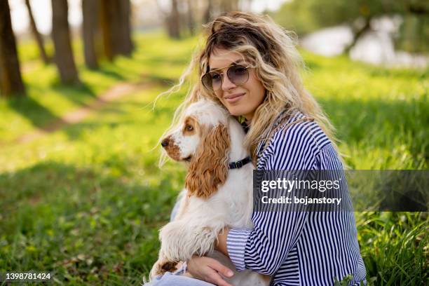 portrait of happy friends in nature - cocker spaniel stock pictures, royalty-free photos & images