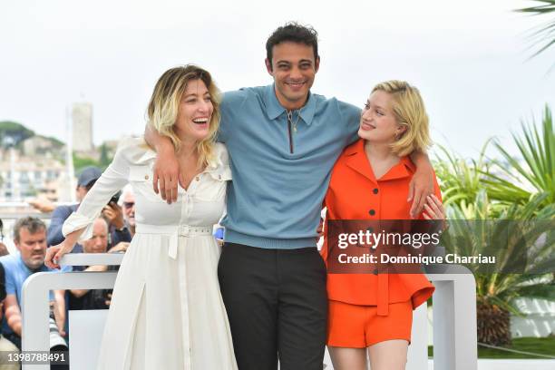 Director Valeria Bruni Tedeschi, Sofiane Bennacer, and Nadia Tereszkiewicz attend the photocall for "Forever Young " during the 75th annual Cannes...