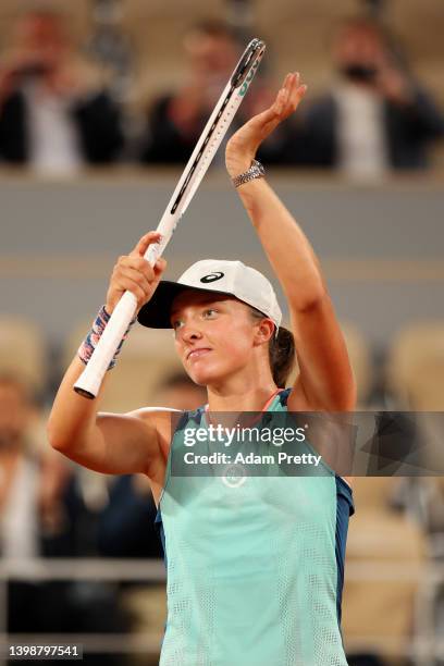 Iga Swiatek of Poland celebrates against Lesia Tsurenko of Ukraine during the Women's Singles First Round match on Day 2 of The 2022 French Open at...