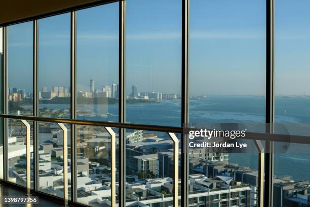 sea view of urban cityscape from empty business office - empty conference centre stock pictures, royalty-free photos & images