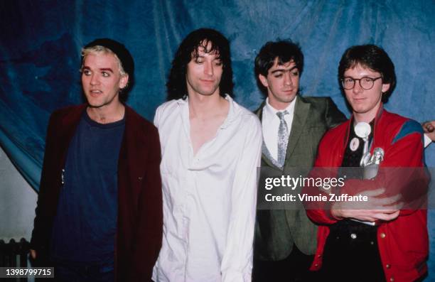 American rock band REM in the press room of the CMJ New Music Awards, held at the Beacon Theatre in New York City, New York, 9th November 1985. The...