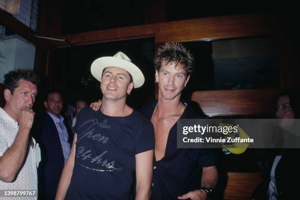 British guitarist and songwriter John Taylor and American guitarist and songwriter Duff McKagan attend the Maverick Records after party, held at the...