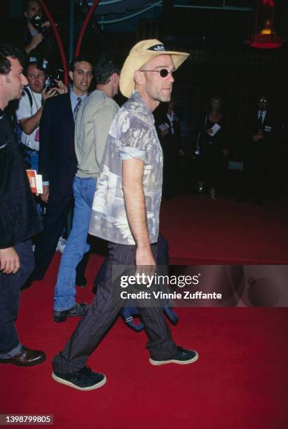 American singer and songwriter Michael Stipe, wearing a straw cowboy hat, attends the Hollywood premiere of 'Escape from LA,' held at the Mann...