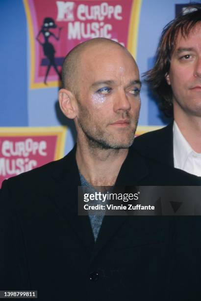 American singer and songwriter Michael Stipe in the press room of the 1998 MTV Europe Music Awards, held at the Fila Forum in Assago, Milan, Italy,...