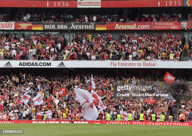 Arsenal fans during the Premier League match between Arsenal and Everton at Emirates Stadium on May 22, 2022 in London, England.