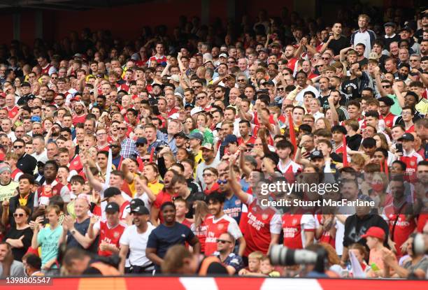 Arsenal fans during the Premier League match between Arsenal and Everton at Emirates Stadium on May 22, 2022 in London, England.