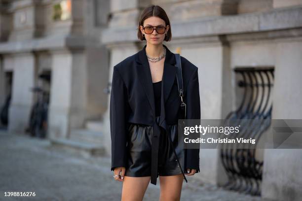 Jacqueline Zelwis is seen wearing black Arakii Blazer, Zara Top, Anine Bing leather shorts, Fendi Boots, Strathberry bag, Corlin Eyewear sunglasses...