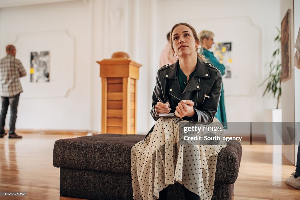 Woman in art gallery
