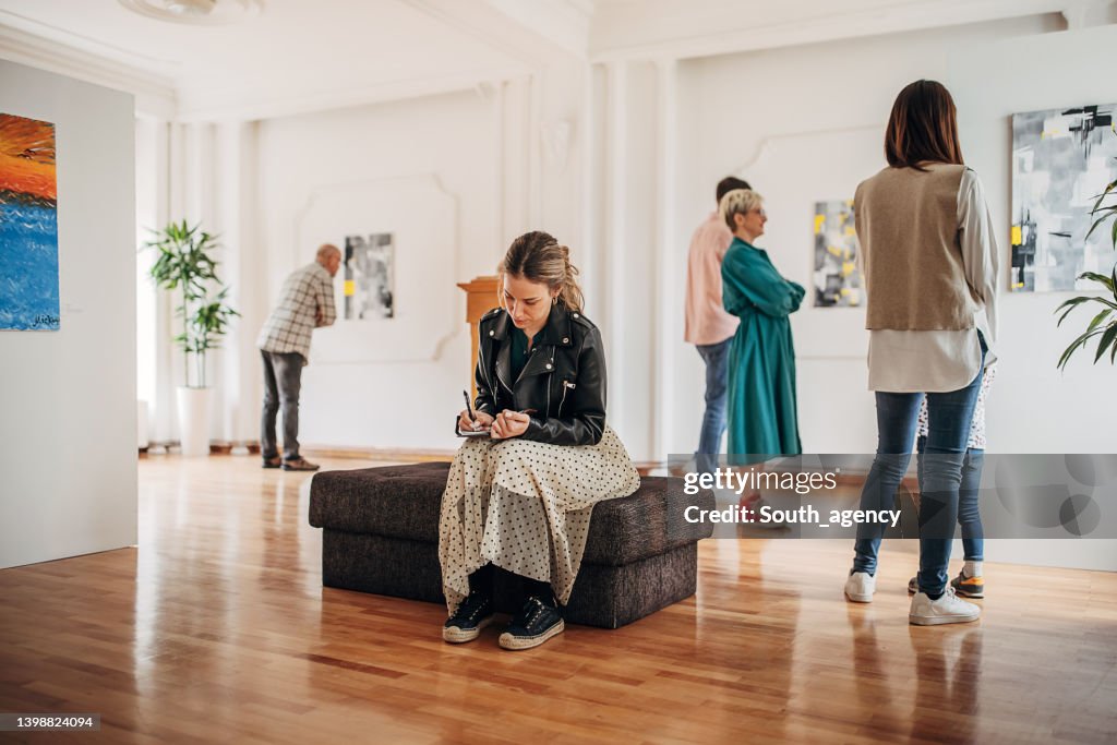 Woman in art gallery