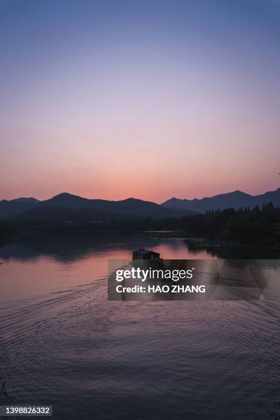 sunset by the river - 寧靜 stock pictures, royalty-free photos & images