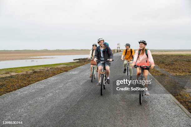 couples on a bike ride - double date stock pictures, royalty-free photos & images