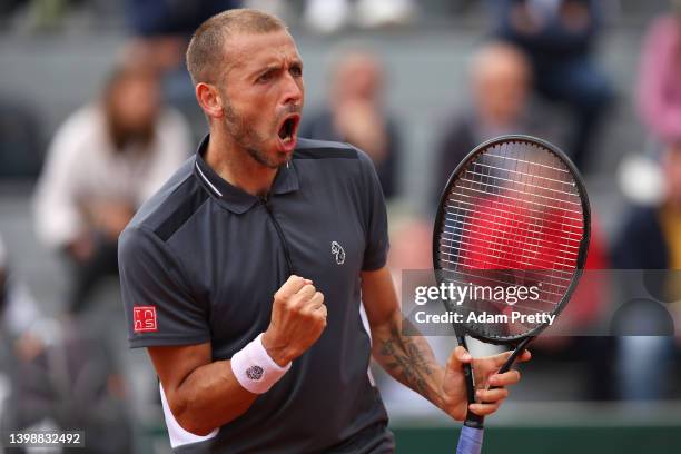 Daniel Evans of Great Britain celebrates against Francisco Cerundolo of Argentina during the Men's Singles First Round match on Day 2 of The 2022...