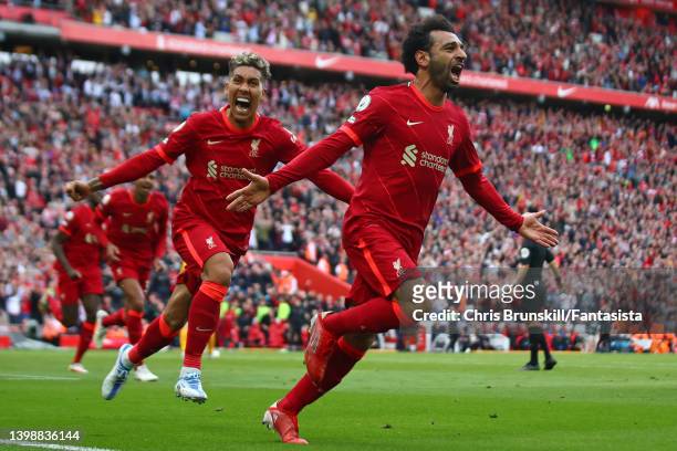 Mohamed Salah of Liverpool celebrates scoring his side's second goal during the Premier League match between Liverpool and Wolverhampton Wanderers at...