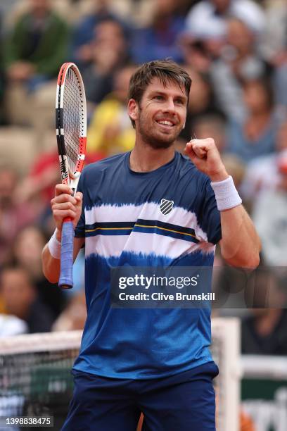 Cameron Norrie of Great Britain celebrates match point against Manuel Guinard of France during the Men's Singles First Round match on Day 2 of The...