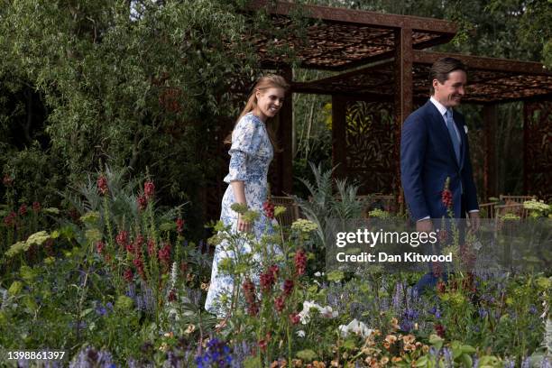 Princess Beatrice and her husband, Edoardo Mapelli Mozzi are given a tour during a visit to The Chelsea Flower Show 2022 at the Royal Hospital...