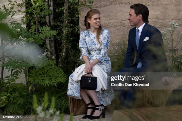 Princess Beatrice and her husband, Edoardo Mapelli Mozzi are given a tour during a visit to The Chelsea Flower Show 2022 at the Royal Hospital...