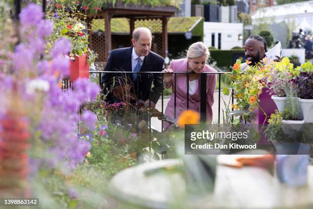 Prince Edward, Earl of Wessex and Sophie, Countess of Wessex are given a tour of "The Cirrus Garden" by designer, Jason Williams during a visit to...