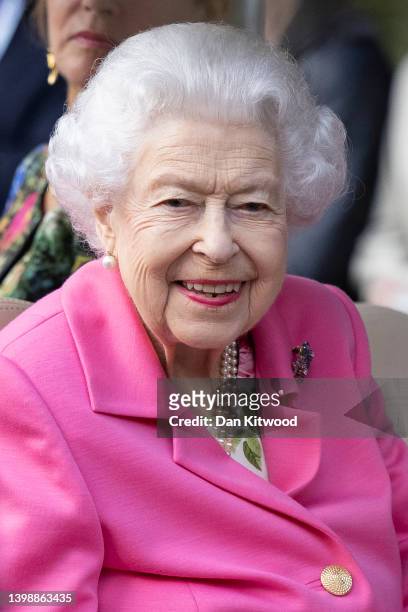 Queen Elizabeth II is given a tour of the Royal Horticultural Society during a visit to The Chelsea Flower Show 2022 at the Royal Hospital Chelsea on...
