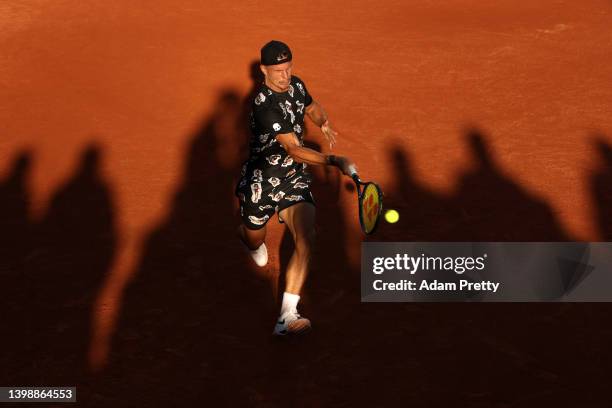 Marton Fucsovics of Hungary plays a forehand against Geoffrey Blancaneaux of France during the Men's Singles First Round match on Day 2 of The 2022...