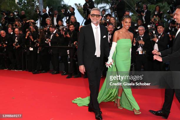 Vincent Cassel and Tina Kunakey attend the screening of "Crimes Of The Future" during the 75th annual Cannes film festival at Palais des Festivals on...